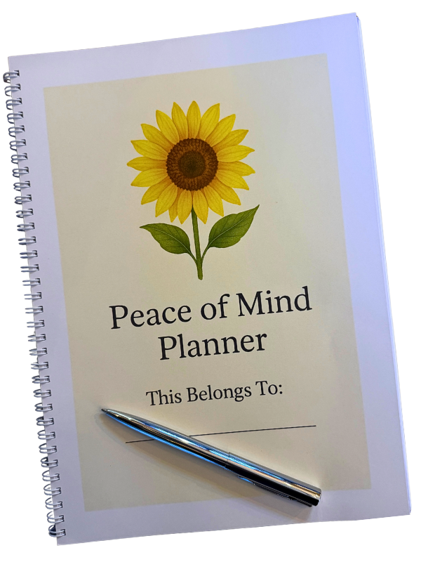 Peace Of Mind Planner The cover of Jayne's Peace of Mind Planner showing a ring-bound planner with a sunflower on the cover.