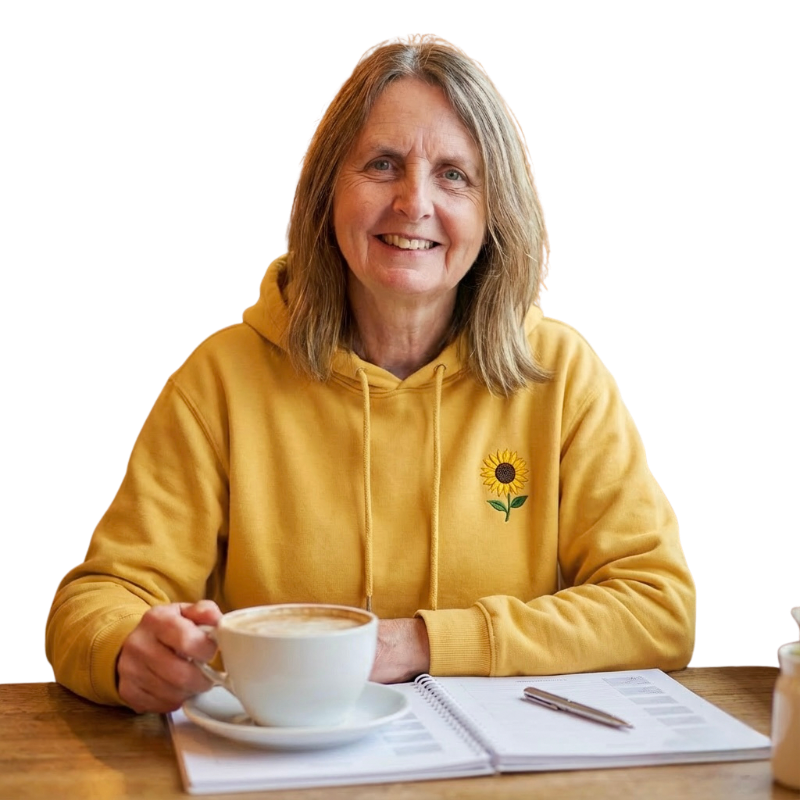 Jayne filling in the Peace of Mind Planner Jayne drinking a cuppa and completing one of her Peace of Mind Planners